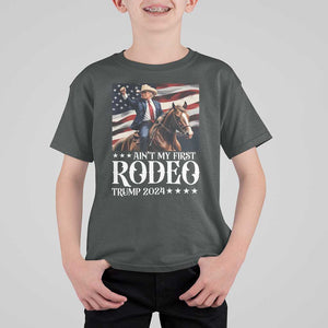 Funny Ain't My First Rodeo Trump 2024 T Shirt For Kid Western Cowboy American Flag TS11 Dark Heather Print Your Wear