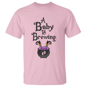 Funny Halloween Pregnancy Announcement T Shirt A Baby Is Brewing Witch Cauldron Footprint Pregnant Baby TS11 Light Pink Print Your Wear