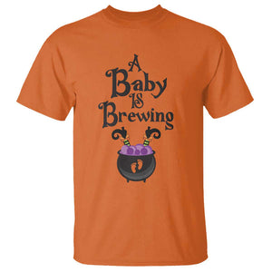 Funny Halloween Pregnancy Announcement T Shirt A Baby Is Brewing Witch Cauldron Footprint Pregnant Baby TS11 Orange Print Your Wear