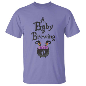 Funny Halloween Pregnancy Announcement T Shirt A Baby Is Brewing Witch Cauldron Footprint Pregnant Baby TS11 Violet Print Your Wear