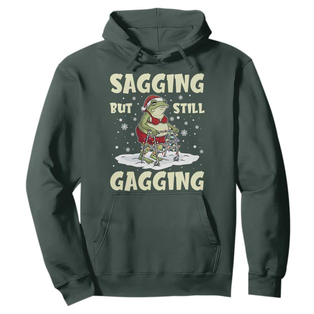 Funny Sagging But Still Gagging Christmas Frog Hoodie Funny Cringe Meme Gag Humor TS11 Dark Forest Green Print Your Wear