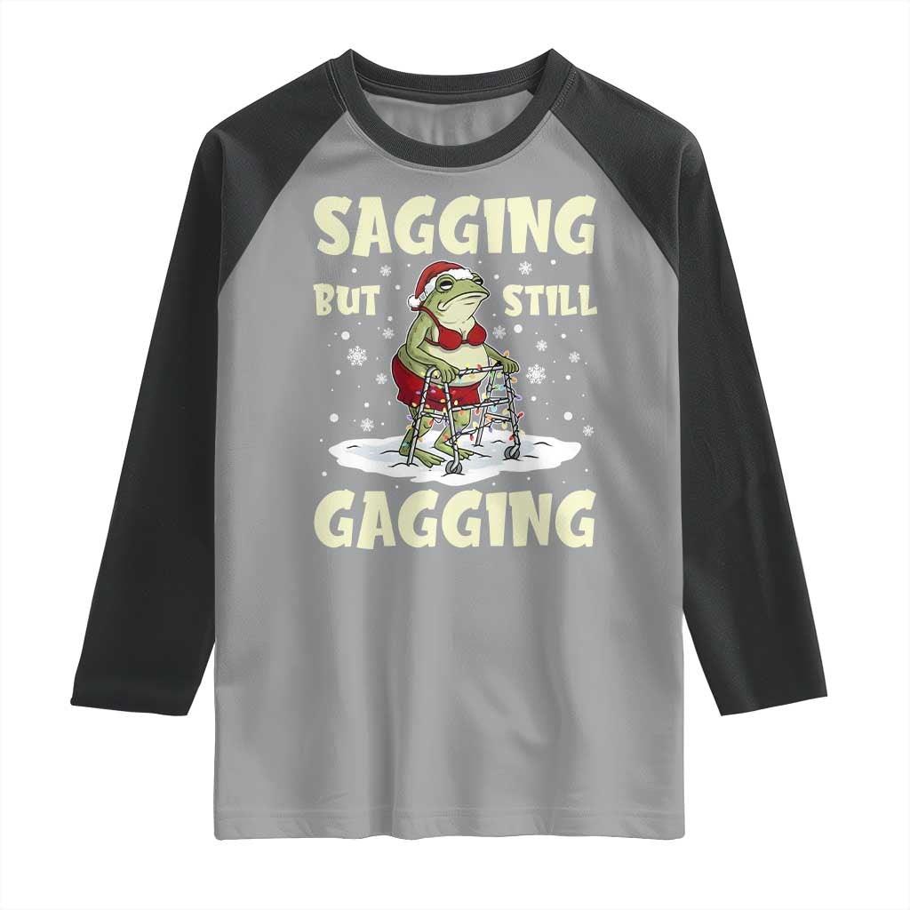 Funny Sagging But Still Gagging Christmas Frog Raglan Shirt Funny Cringe Meme Gag Humor TS11 Sport Gray Black Print Your Wear