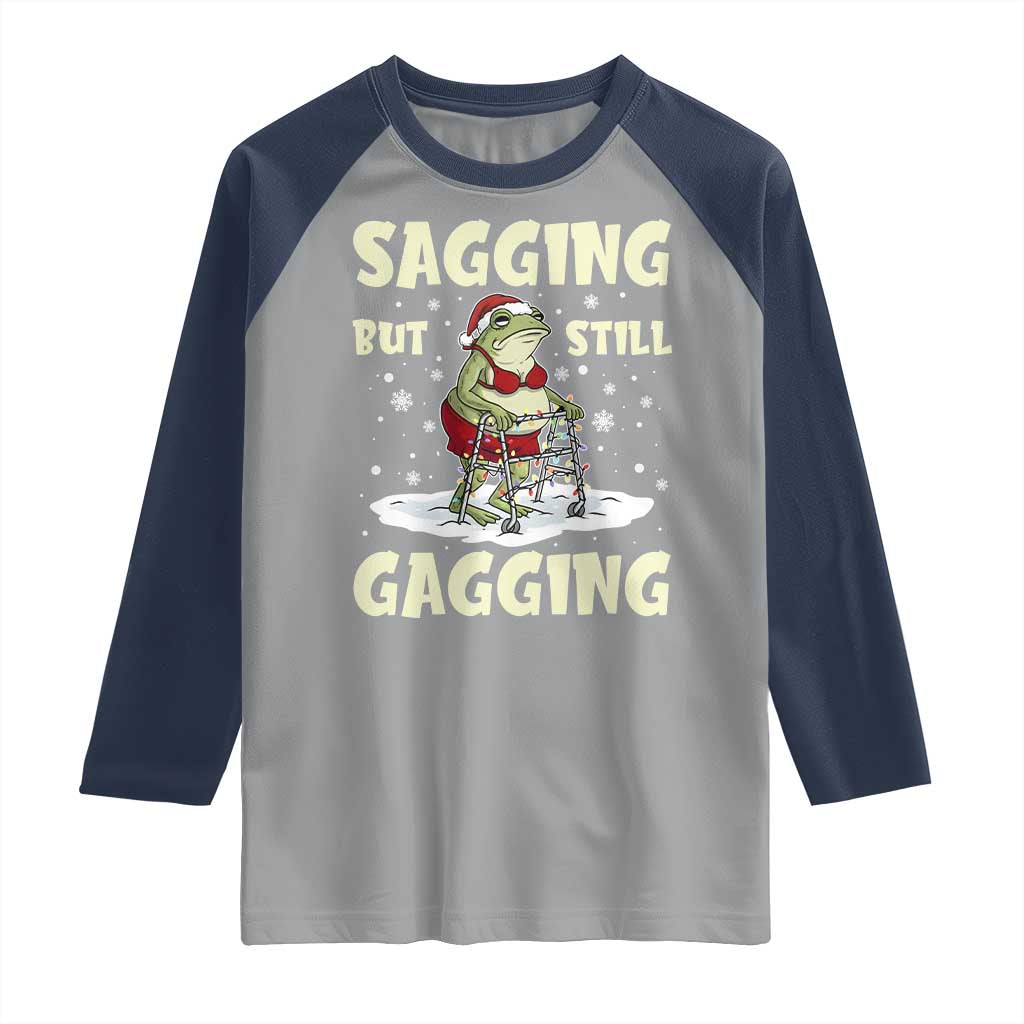 Funny Sagging But Still Gagging Christmas Frog Raglan Shirt Funny Cringe Meme Gag Humor TS11 Sport Gray Navy Print Your Wear