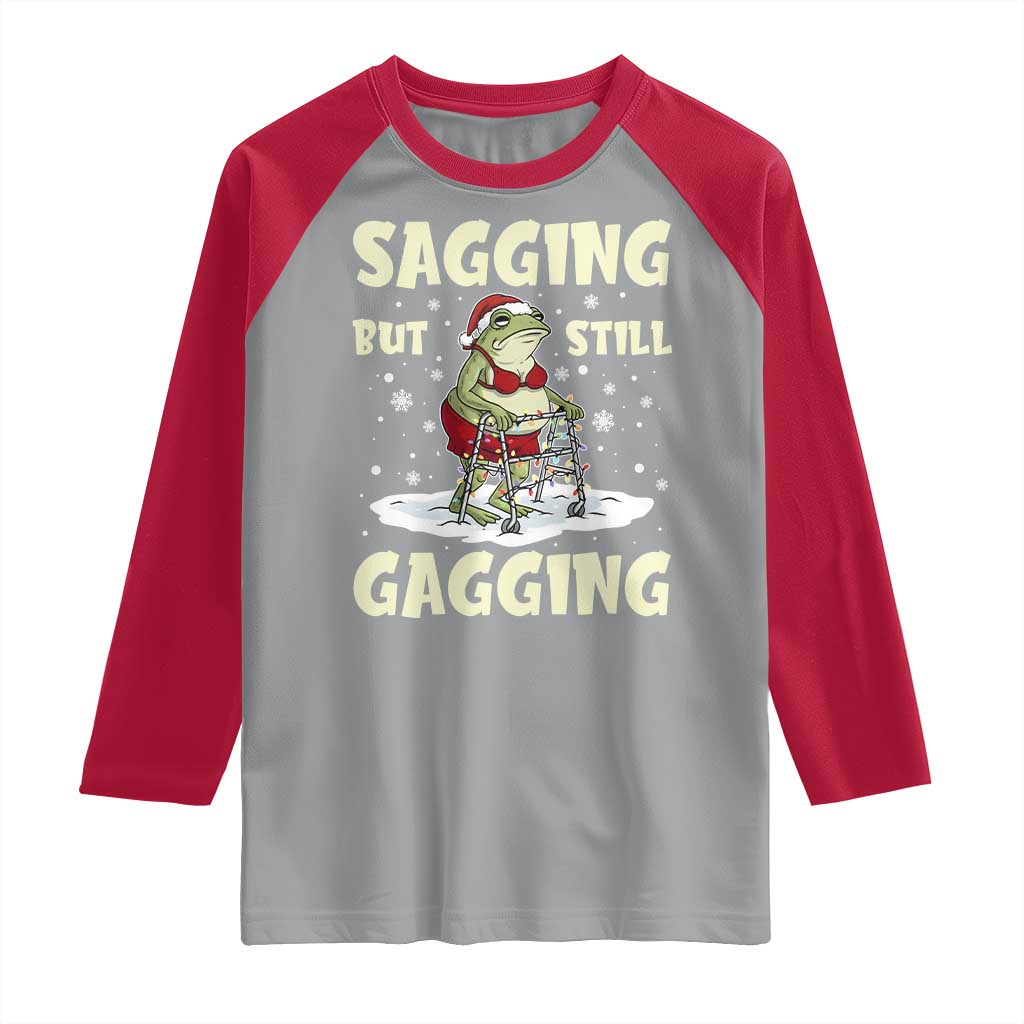 Funny Sagging But Still Gagging Christmas Frog Raglan Shirt Funny Cringe Meme Gag Humor TS11 Sport Gray Red Print Your Wear