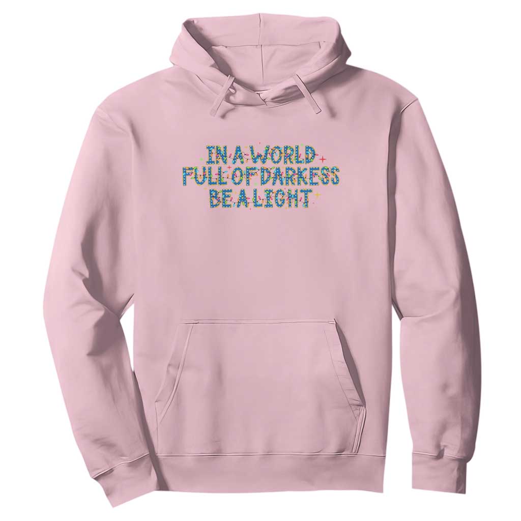 In A World Full Of Darkness Be A Light Hoodie Christmas Quote Gift TS12 Light Pink Print Your Wear