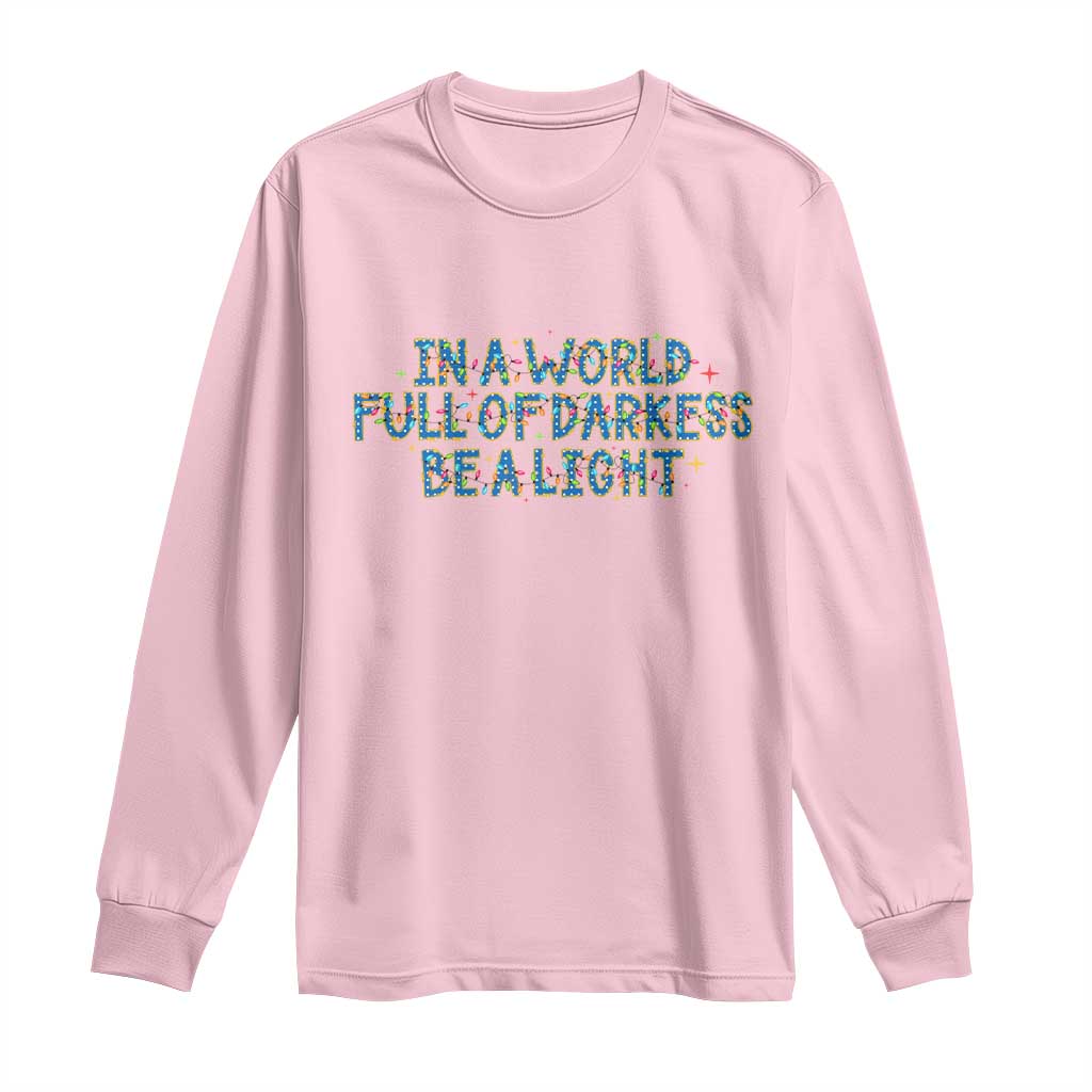 In A World Full Of Darkness Be A Light Long Sleeve Shirt Christmas Quote Gift TS12 Light Pink Print Your Wear