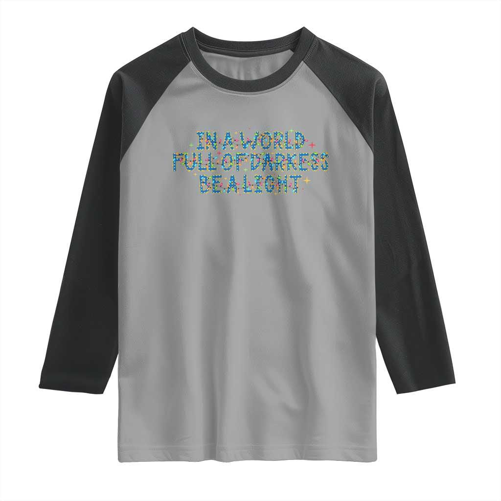 In A World Full Of Darkness Be A Light Raglan Shirt Christmas Quote Gift TS12 Sport Gray Black Print Your Wear