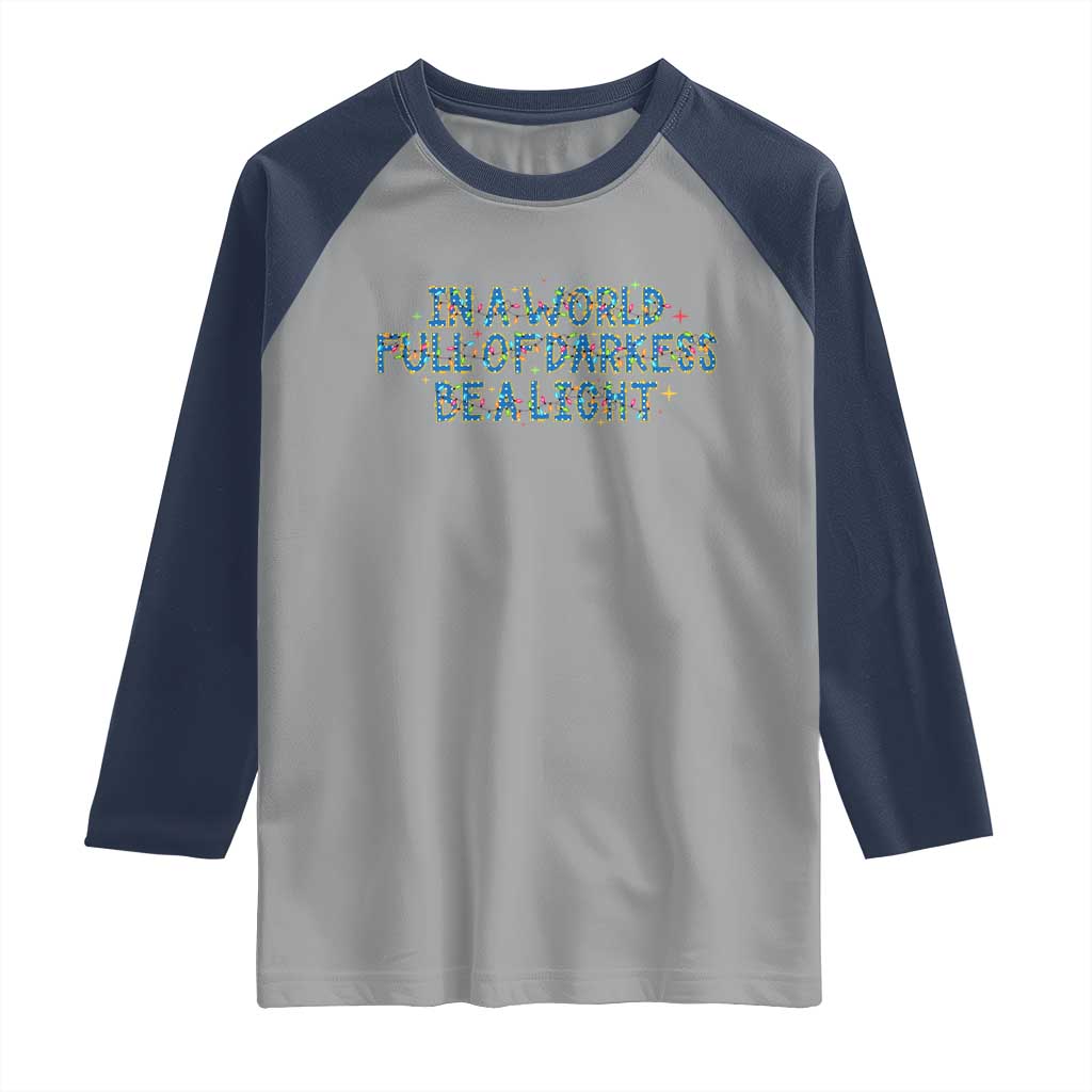 In A World Full Of Darkness Be A Light Raglan Shirt Christmas Quote Gift TS12 Sport Gray Navy Print Your Wear