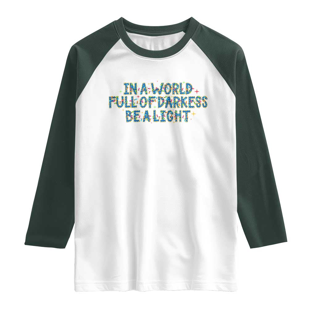 In A World Full Of Darkness Be A Light Raglan Shirt Christmas Quote Gift TS12 White Dark Forest Green Print Your Wear