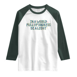 In A World Full Of Darkness Be A Light Raglan Shirt Christmas Quote Gift TS12 White Dark Forest Green Print Your Wear