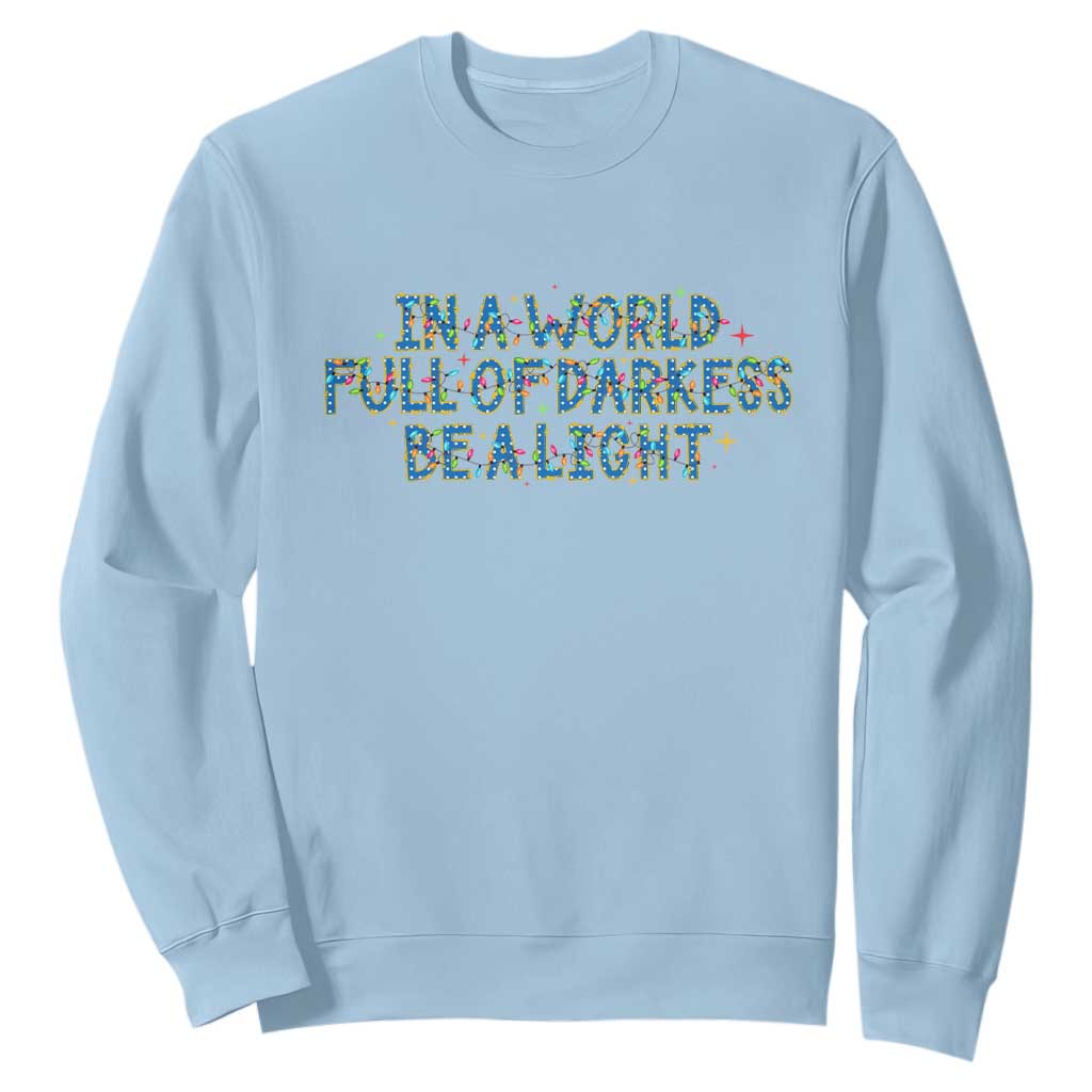 In A World Full Of Darkness Be A Light Sweatshirt Christmas Quote Gift TS12 Light Blue Print Your Wear