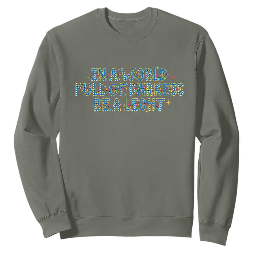 In A World Full Of Darkness Be A Light Sweatshirt Christmas Quote Gift TS12 Military Green Print Your Wear