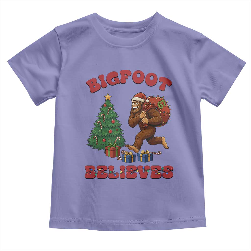 Funny Bigfoot Santa Believes Six Seven Meme Toddler T Shirt Trendy Gen Z Xmas Gift TS12 Violet Print Your Wear