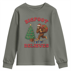 Funny Bigfoot Santa Believes Six Seven Meme Youth Sweatshirt Trendy Gen Z Xmas Gift TS12 Military Green Print Your Wear