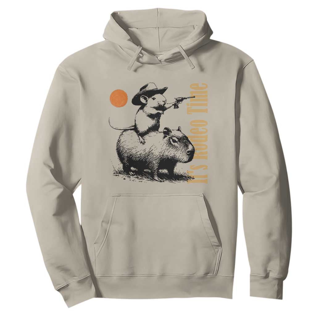 It Is Rodeo Time Hoodie Funny Wild West Mouse Riding Capybara TS12 Sand Print Your Wear