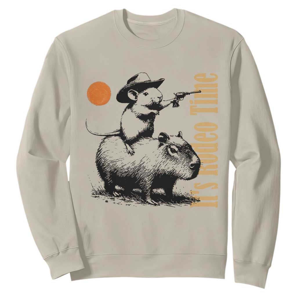 It Is Rodeo Time Sweatshirt Funny Wild West Mouse Riding Capybara TS12 Sand Print Your Wear