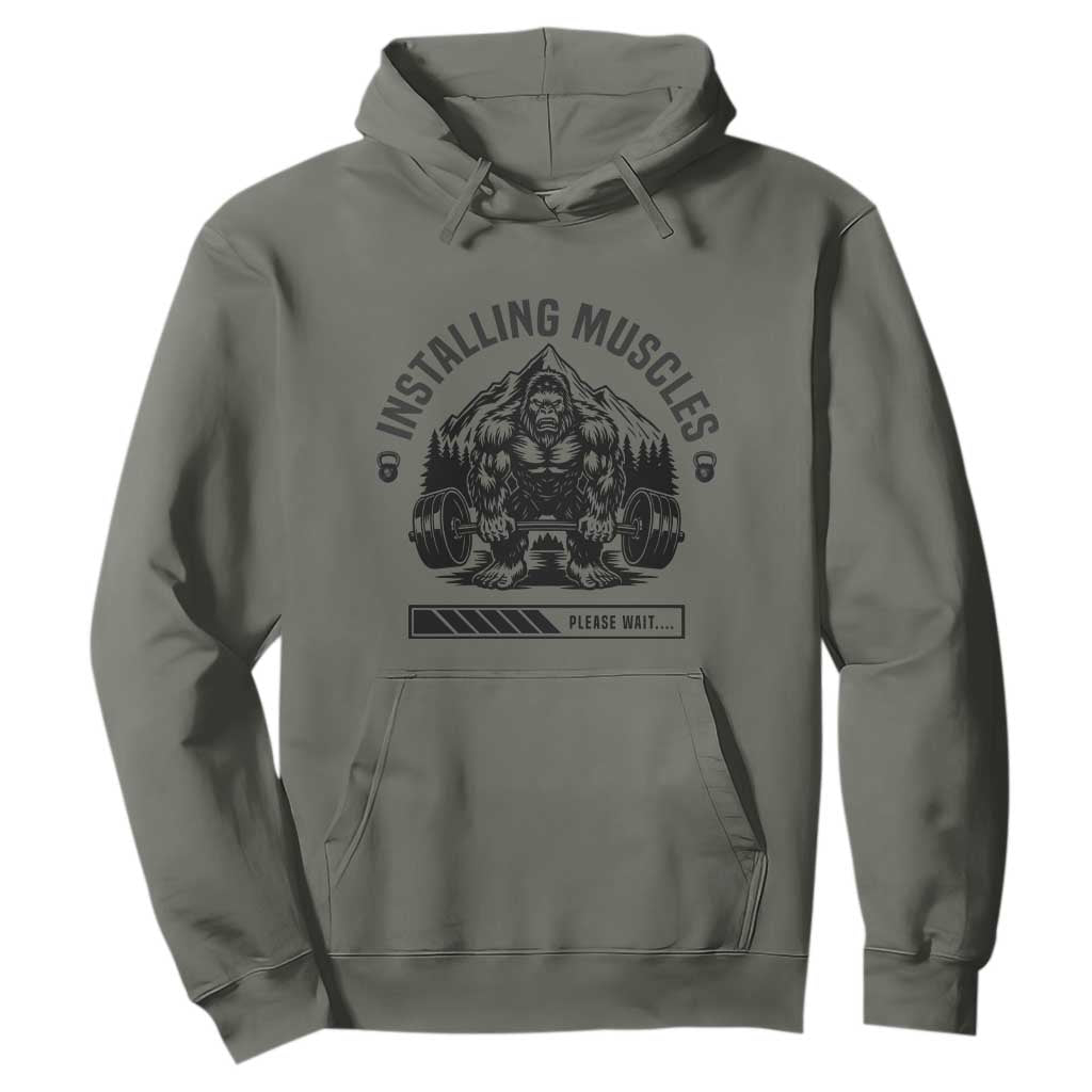 Installing Muscles Please Wait Hoodie Bigfoot Funny Gym Workout Gift TS12 Military Green Print Your Wear