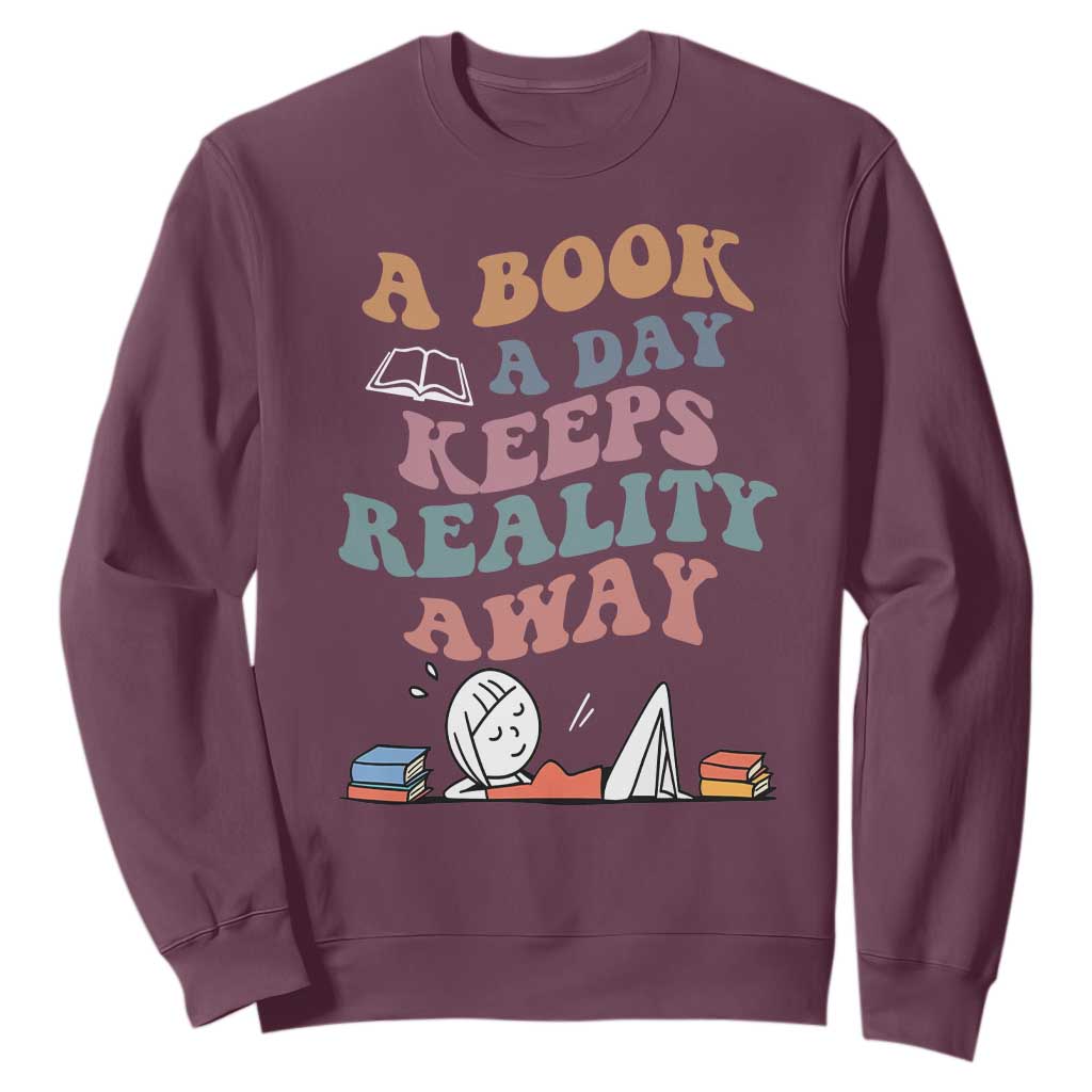 A Book A Day Keeps Reality Away Sweatshirt Cute Girl Book Lover TS12 Maroon Print Your Wear