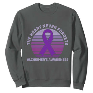 The Heart Never Forgets Alzheimers Support Sweatshirt Vintage Sunset Purple Ribbon Graphic