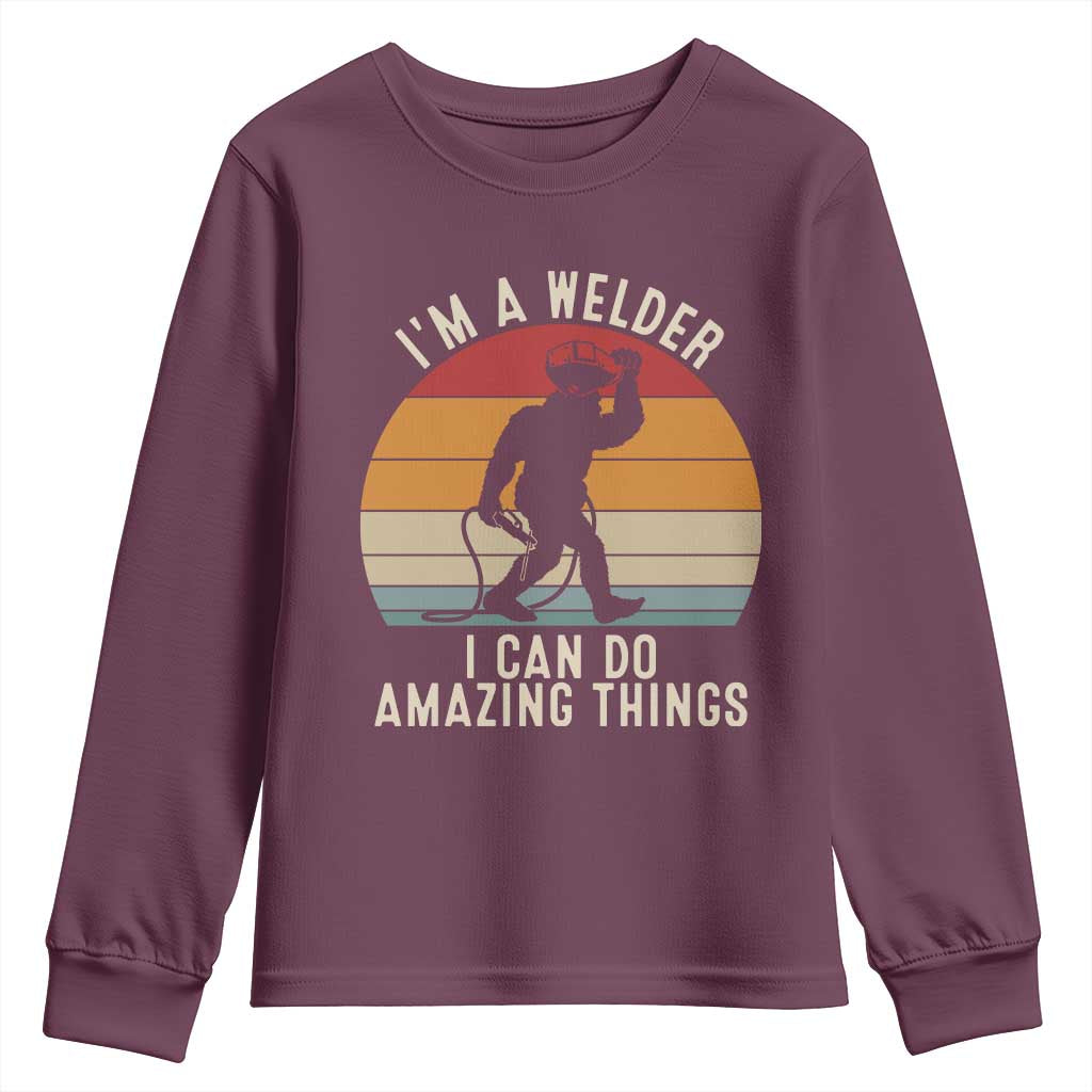 Funny Bigfoot Welding Gift Youth Sweatshirt I Can Do Amazing Things With A Welder TS12 Maroon Print Your Wear