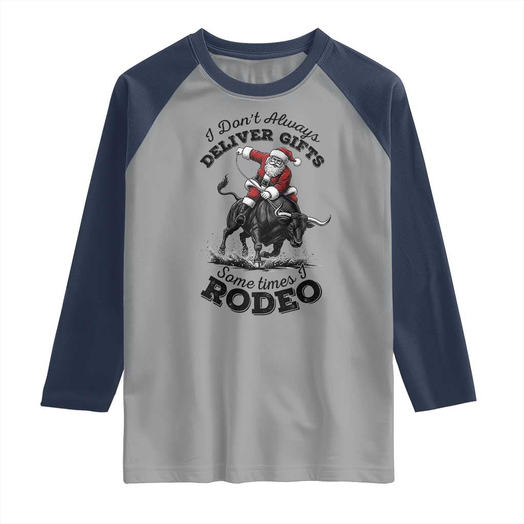 Funny Black Santa Cowboy Bull Rider Christmas Raglan Shirt I Do Not Deliver Gifts I Rodeo TS12 Sport Gray Navy Print Your Wear