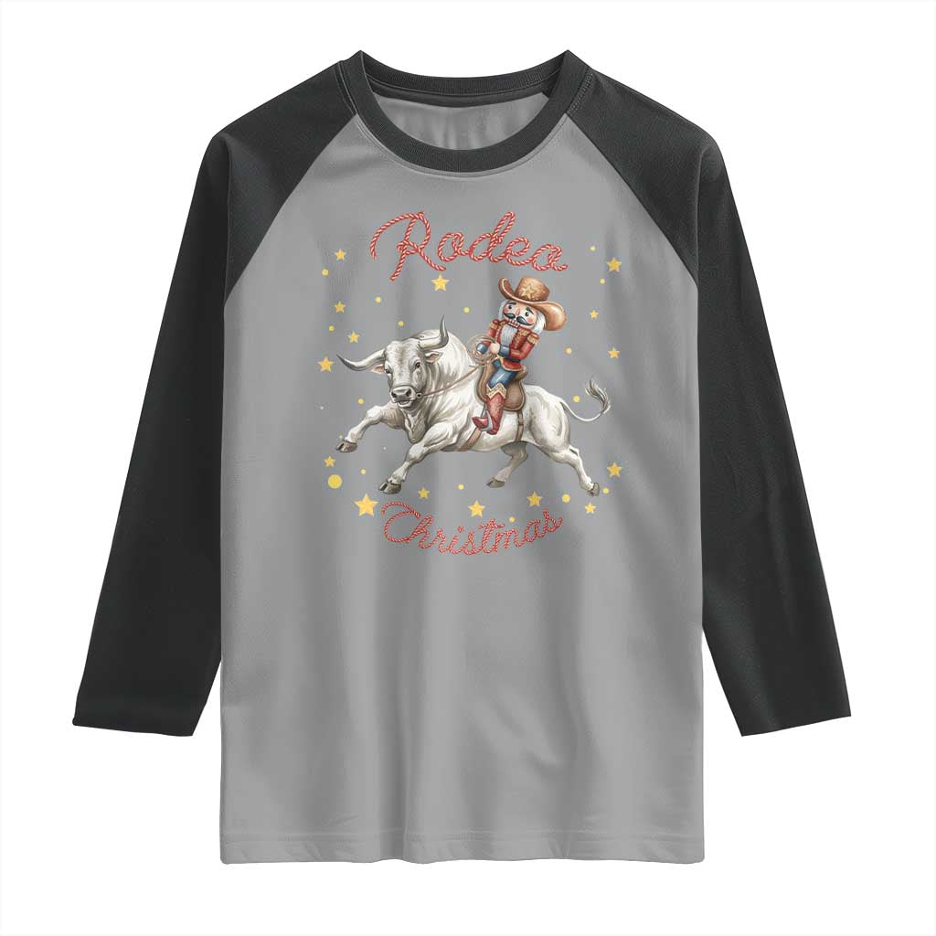 Funny Nutcracker Bull Riding Rodeo Christmas Raglan Shirt Western Holiday Gift TS12 Sport Gray Black Print Your Wear