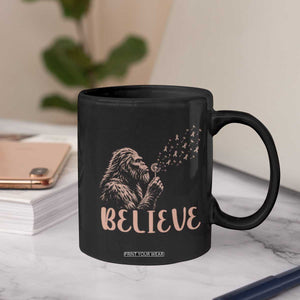 Funny Bigfoot Blowing Dandelion Flower Graphic Coffee Mug Believe Endometrial Cancer Awareness