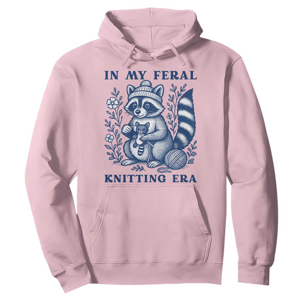 In My Feral Knitting Era Hoodie Raccoon Yarn Lover TS12 Light Pink Print Your Wear