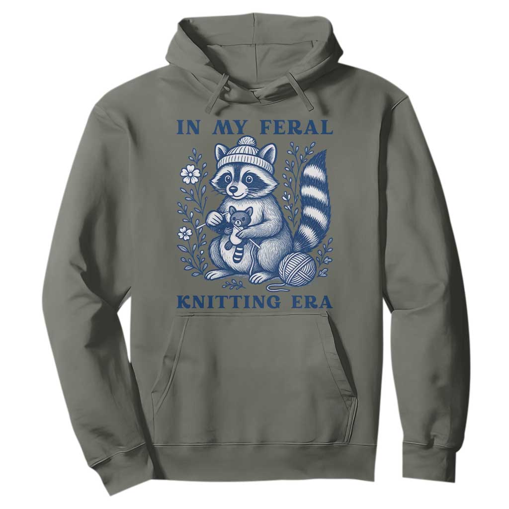 In My Feral Knitting Era Hoodie Raccoon Yarn Lover TS12 Military Green Print Your Wear