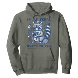 In My Feral Knitting Era Hoodie Raccoon Yarn Lover TS12 Military Green Print Your Wear