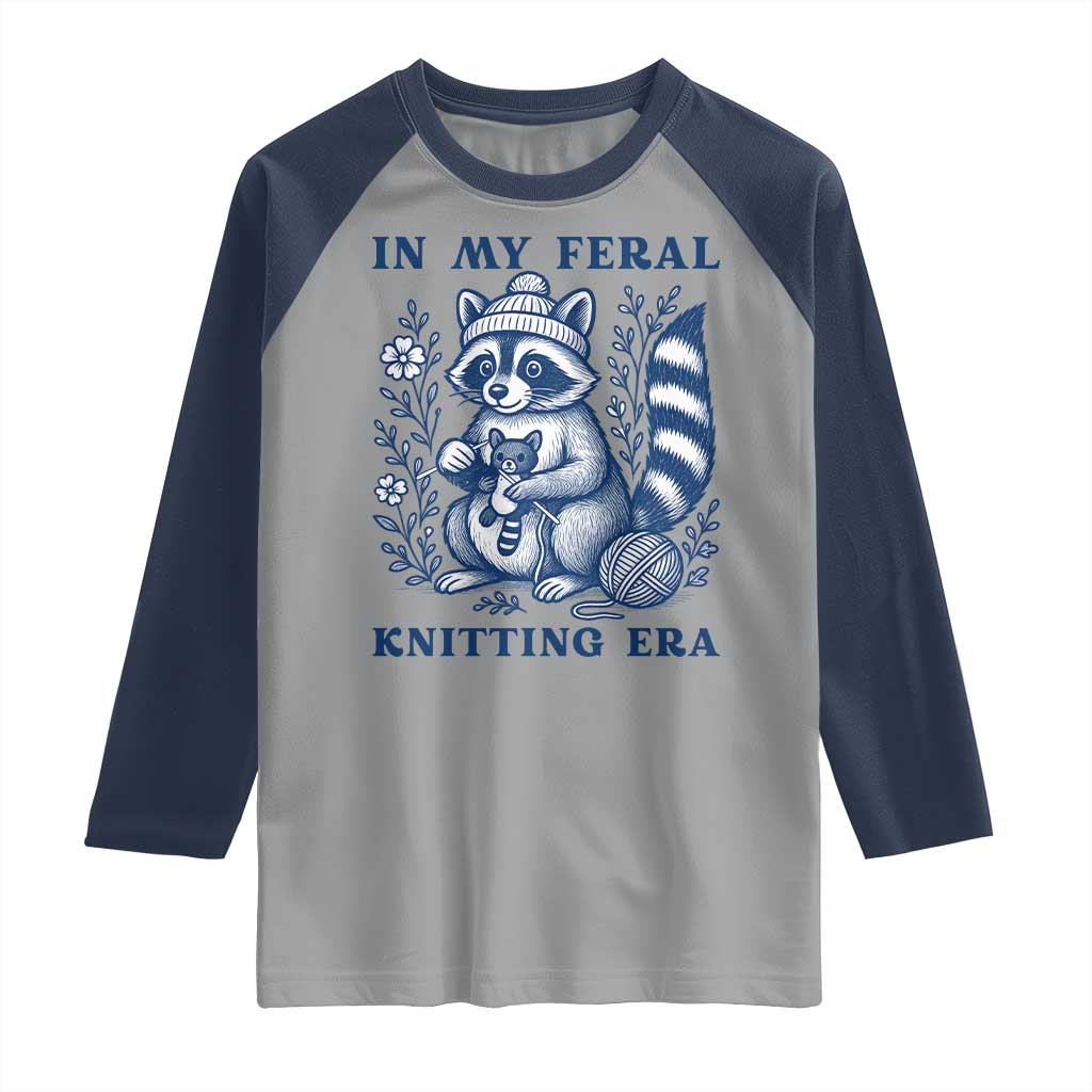 In My Feral Knitting Era Raglan Shirt Raccoon Yarn Lover TS12 Sport Gray Navy Print Your Wear