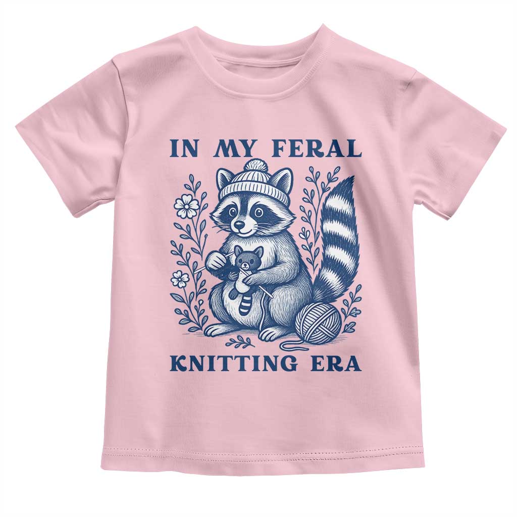 In My Feral Knitting Era Toddler T Shirt Raccoon Yarn Lover TS12 Light Pink Print Your Wear