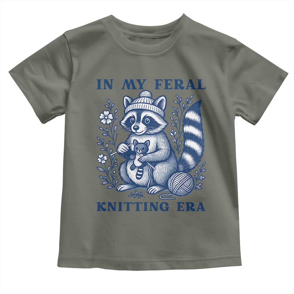 In My Feral Knitting Era Toddler T Shirt Raccoon Yarn Lover TS12 Military Green Print Your Wear