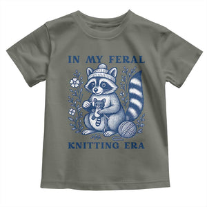In My Feral Knitting Era Toddler T Shirt Raccoon Yarn Lover TS12 Military Green Print Your Wear