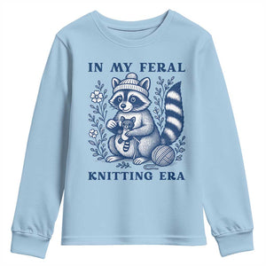 In My Feral Knitting Era Youth Sweatshirt Raccoon Yarn Lover TS12 Light Blue Print Your Wear