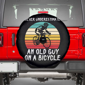 Never Underestimate An Old Guy On A Bicycle Spare Tire Cover Cycling Lover Gift