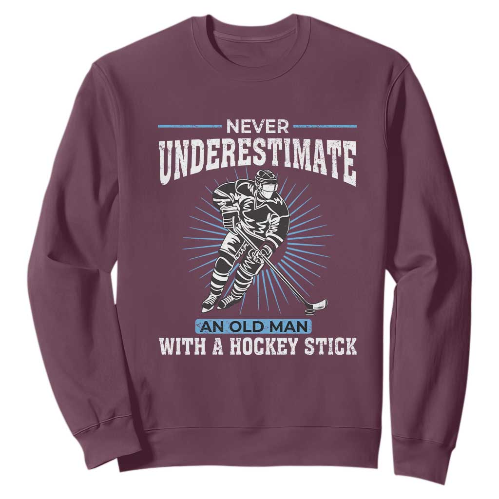 Never Underestimate An Old Man With A Hockey Stick Sweatshirt Ice Hockey Gift TS12 Maroon Print Your Wear