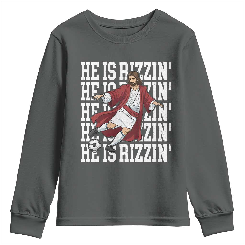 He Is Rizzin Youth Sweatshirt Funny Christian Soccer Lover Gift TS12 Dark Heather Print Your Wear