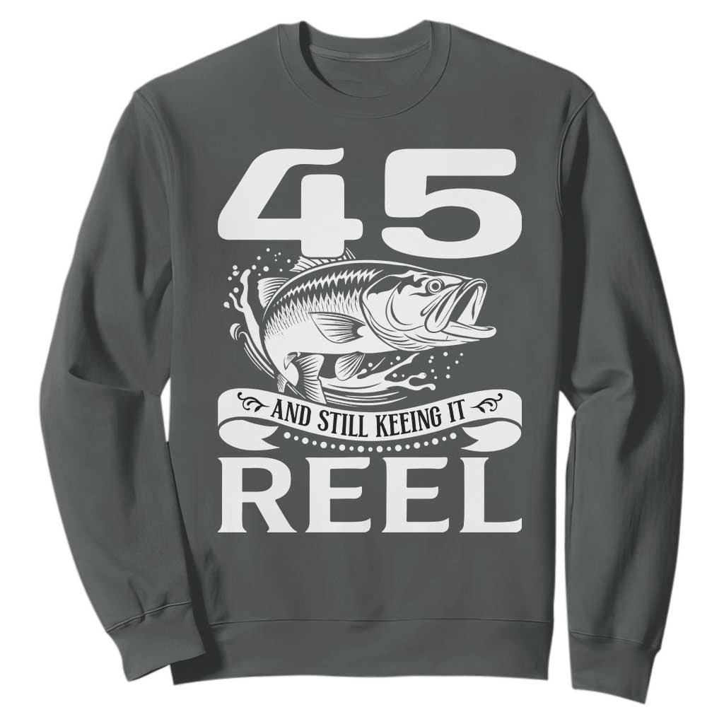 Still Keeping It Reel At 45 Sweatshirt Fisherman Birthday Gift TS12 Dark Heather Print Your Wear