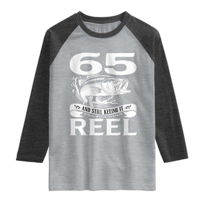 Still Keeping It Reel At 65 Raglan Shirt Fisherman Birthday Gift TS12 Heather Gray Heather Charcoal Print Your Wear