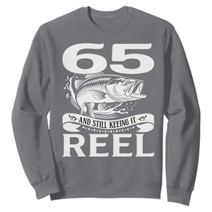 Still Keeping It Reel At 65 Sweatshirt Fisherman Birthday Gift TS12 Charcoal Print Your Wear