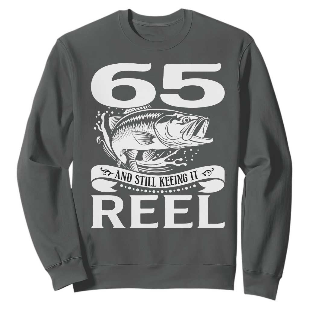 Still Keeping It Reel At 65 Sweatshirt Fisherman Birthday Gift TS12 Dark Heather Print Your Wear