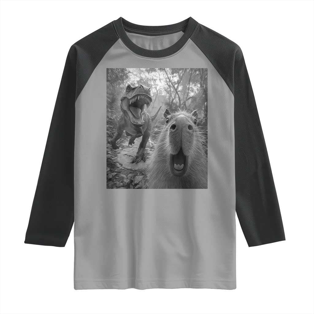 Funny Capybara Selfie With Dinosaur Meme Raglan Shirt Animal Humor Gift TS12 Sport Gray Black Print Your Wear