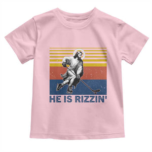 He Is Rizzin Toddler T Shirt Christian Hockey Retro Funny Gift For Believers TS12 Light Pink Print Your Wear
