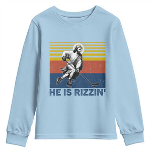 He Is Rizzin Youth Sweatshirt Christian Hockey Retro Funny Gift For Believers TS12 Light Blue Print Your Wear