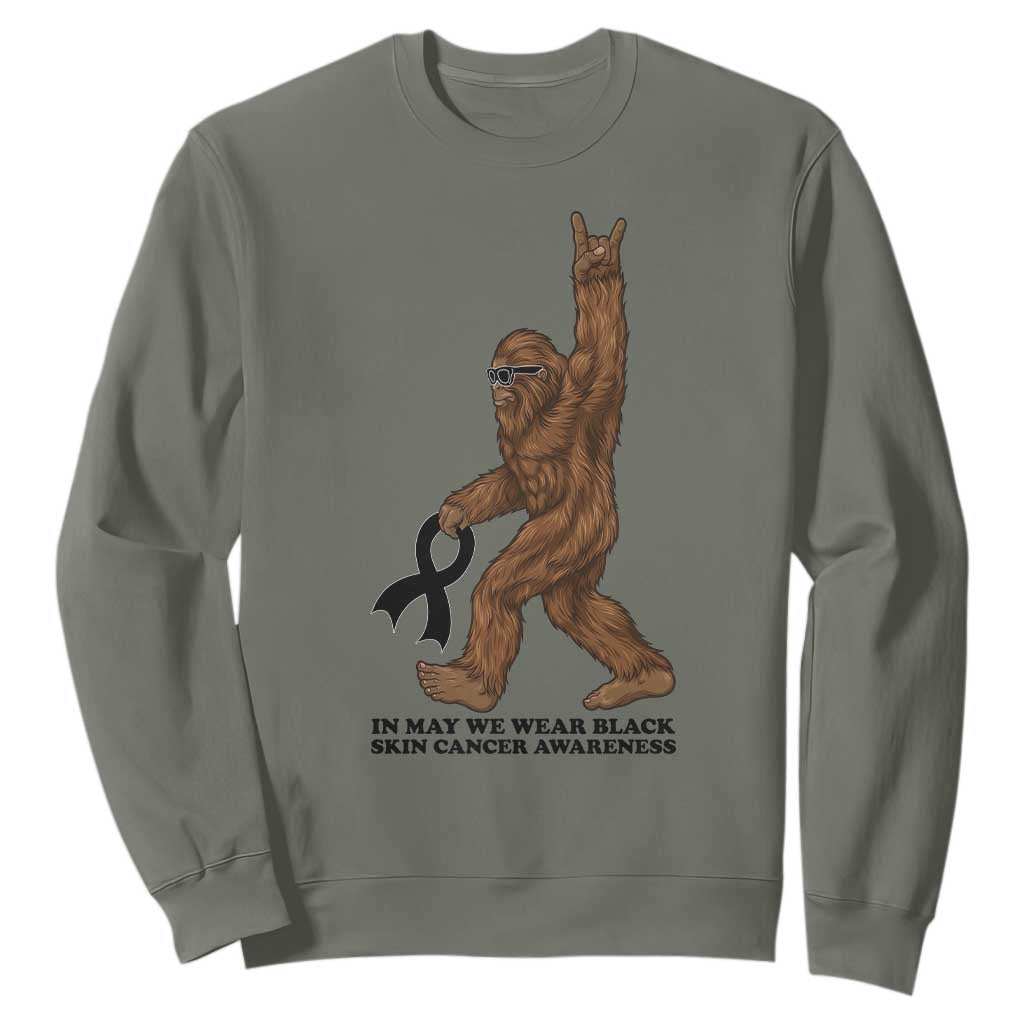 Funny Bigfoot Skin Cancer Support Sweatshirt In May We Wear Black TS12 Military Green Print Your Wear