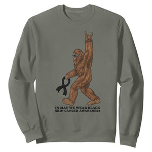 Funny Bigfoot Skin Cancer Support Sweatshirt In May We Wear Black TS12 Military Green Print Your Wear