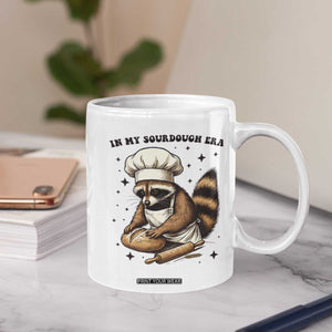 In My Sourdough Era Coffee Mug Funny Raccoon Baker TS14 Print Your Wear