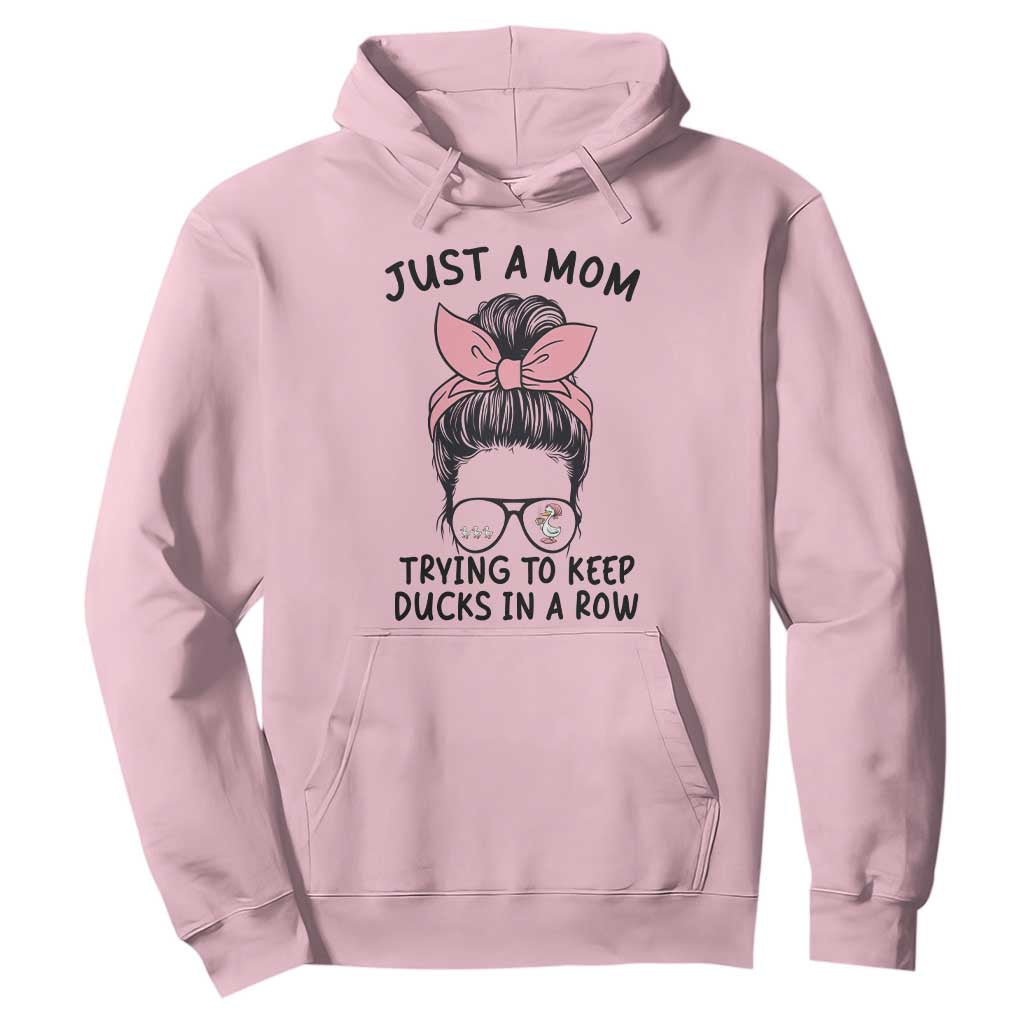 Just A Mom Trying To Keep Her Ducks In A Row Hoodie Funny Duck Mom Messy Hair Bun Moms Life TS14 Light Pink Print Your Wear