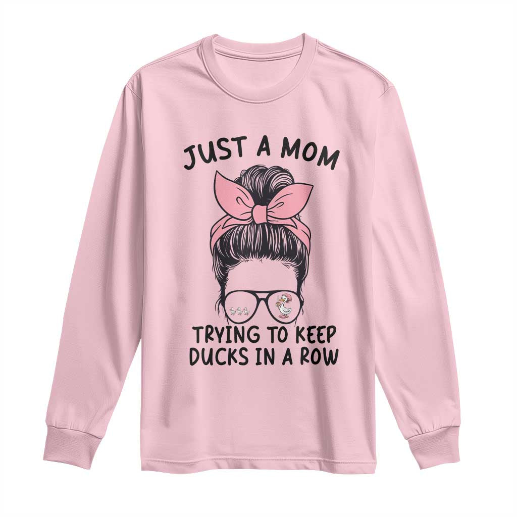 Just A Mom Trying To Keep Her Ducks In A Row Long Sleeve Shirt Funny Duck Mom Messy Hair Bun Moms Life TS14 Light Pink Print Your Wear